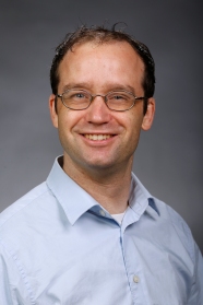 Headshot of Dr. Brian Cozen, assistant professor of communication