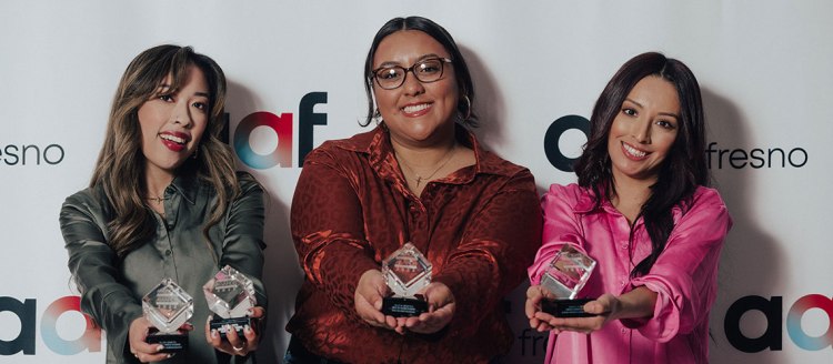 Eliza Gabito, Alicia Benitez and Nayeli Flores show off the top awards of the local ADDYs.
