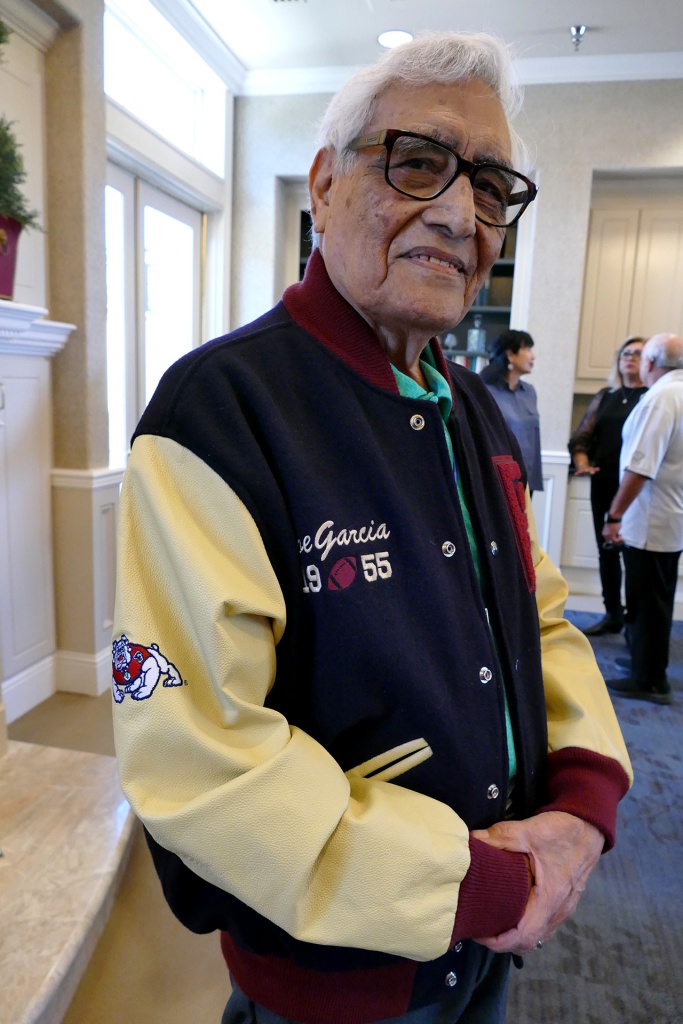 Joe Garcia in his letterman's jacket he recieved in a 2015 ceremony at the Save Mart Center.